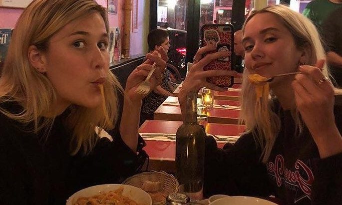Guests sharing pasta at Fiat Cafe